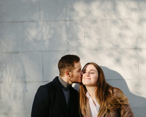 Young Couple walking and talking in the city